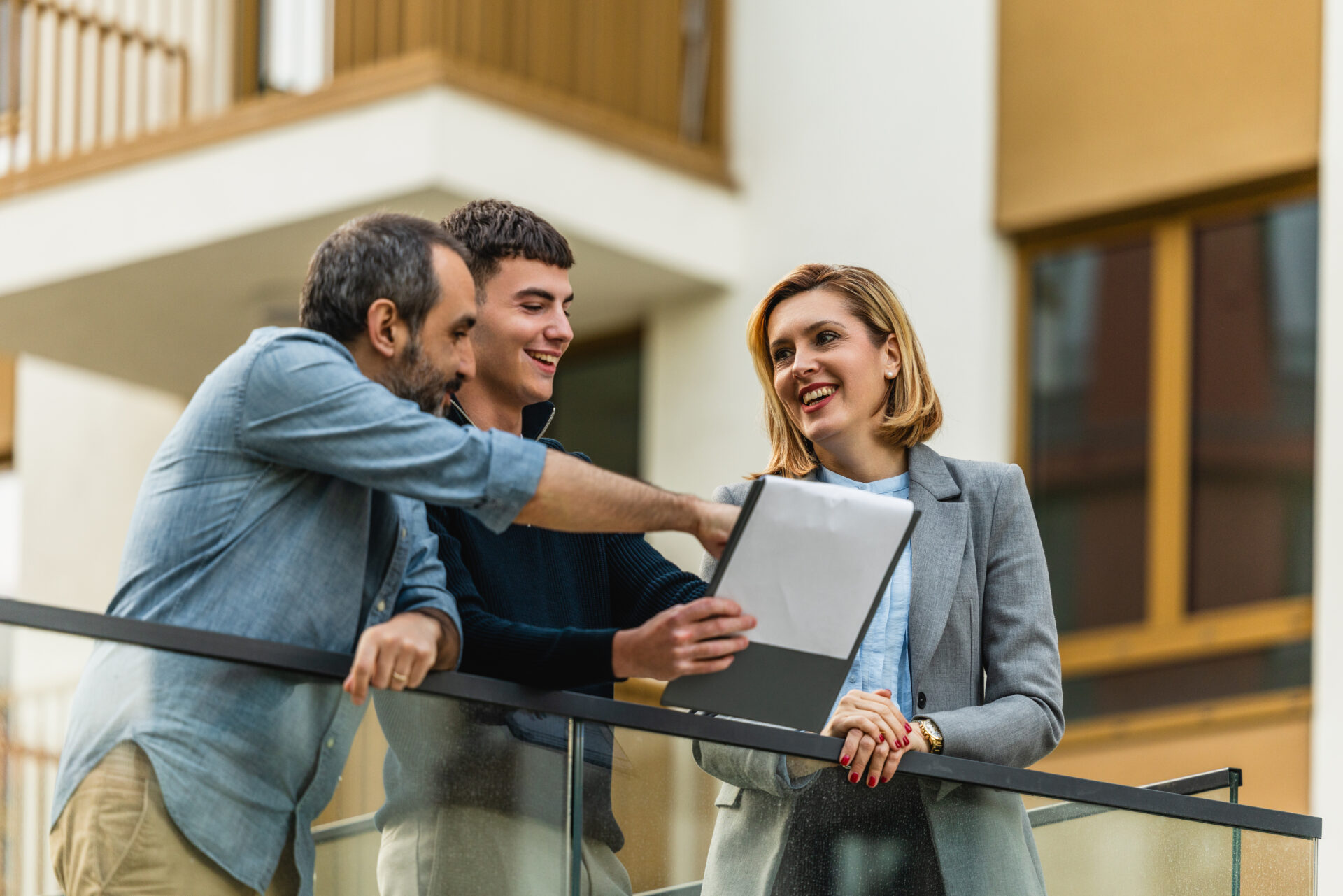 Property professional discussing rental documents with landlords, representing compliance with the Renters’ Rights Act in Doncaster.