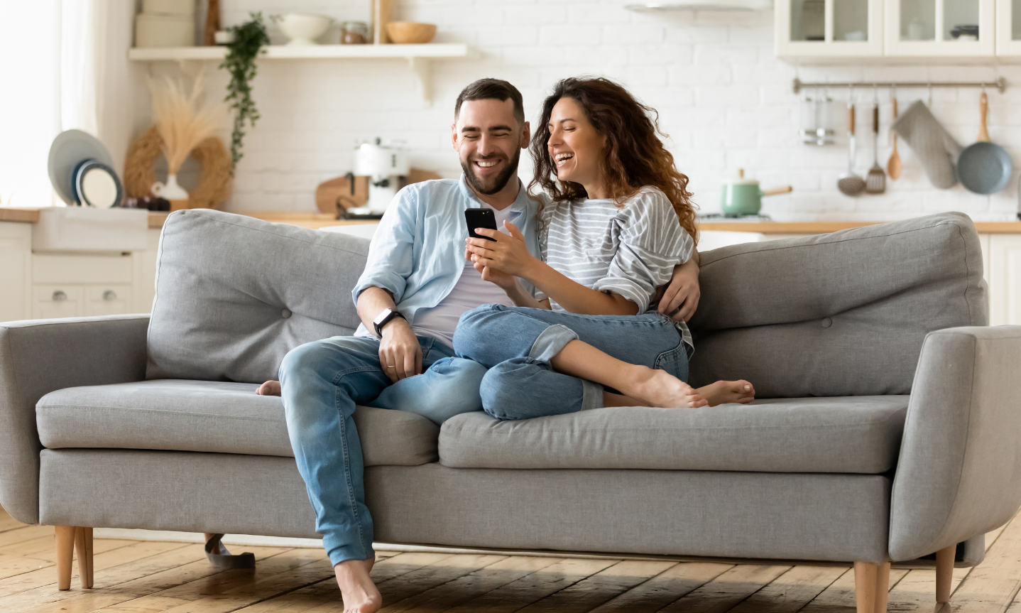 Couple relaxing together in a modern rental home in Tamworth
